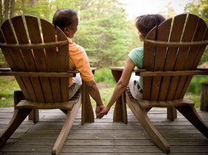 retired couple sitting in adirondack chairs mount kisco ny investment management and financial planning