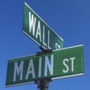 investment management mount kisco ny street sign showing intersection of main street and wall street