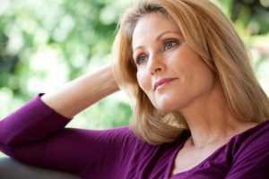 woman pondering financial aspects of divorce mount kisco ny