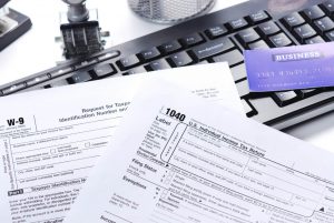 tax return and computer in financial advisors office mount kisco westchester ny